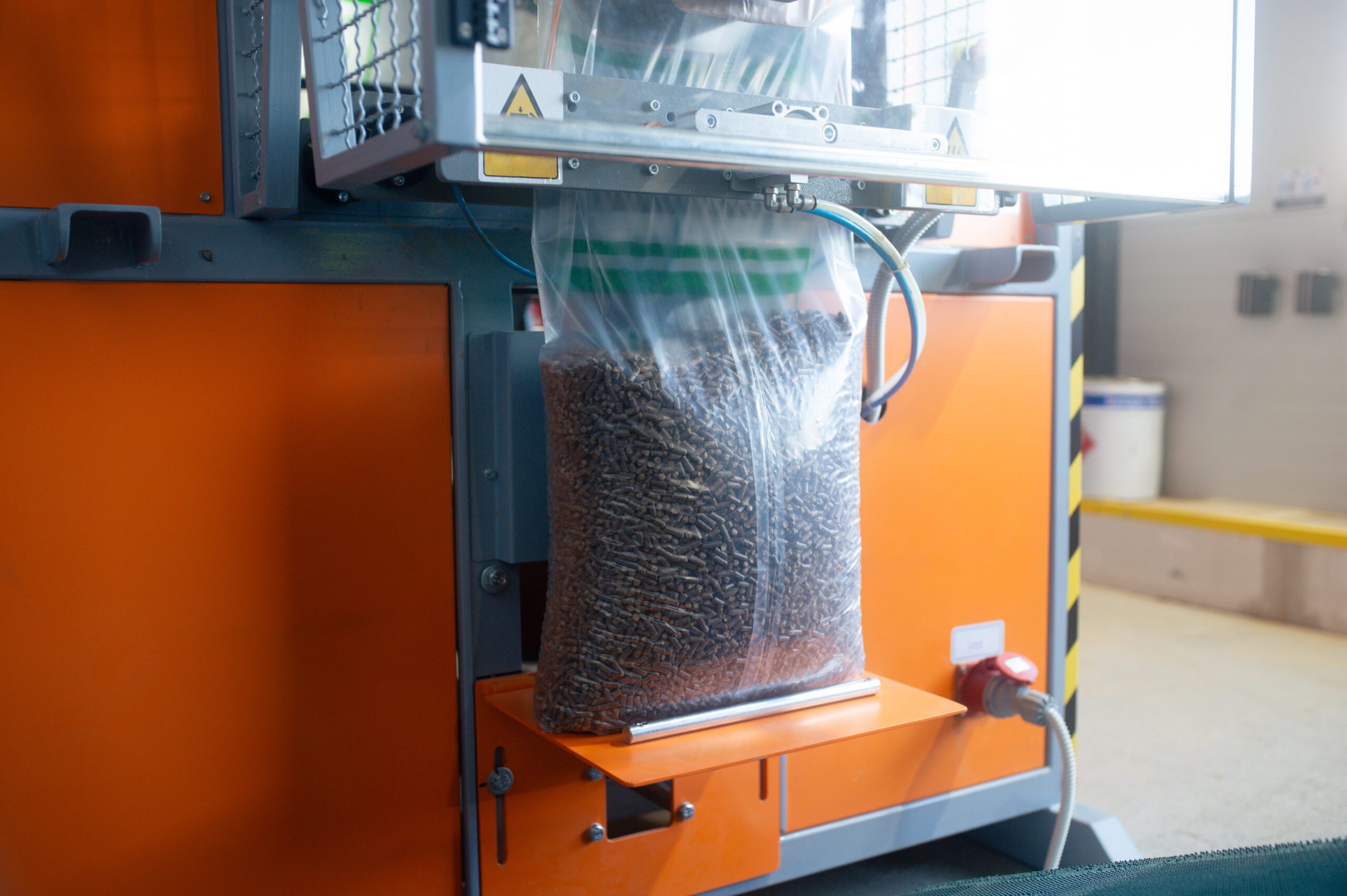 a bag of metal rods being put into a machine