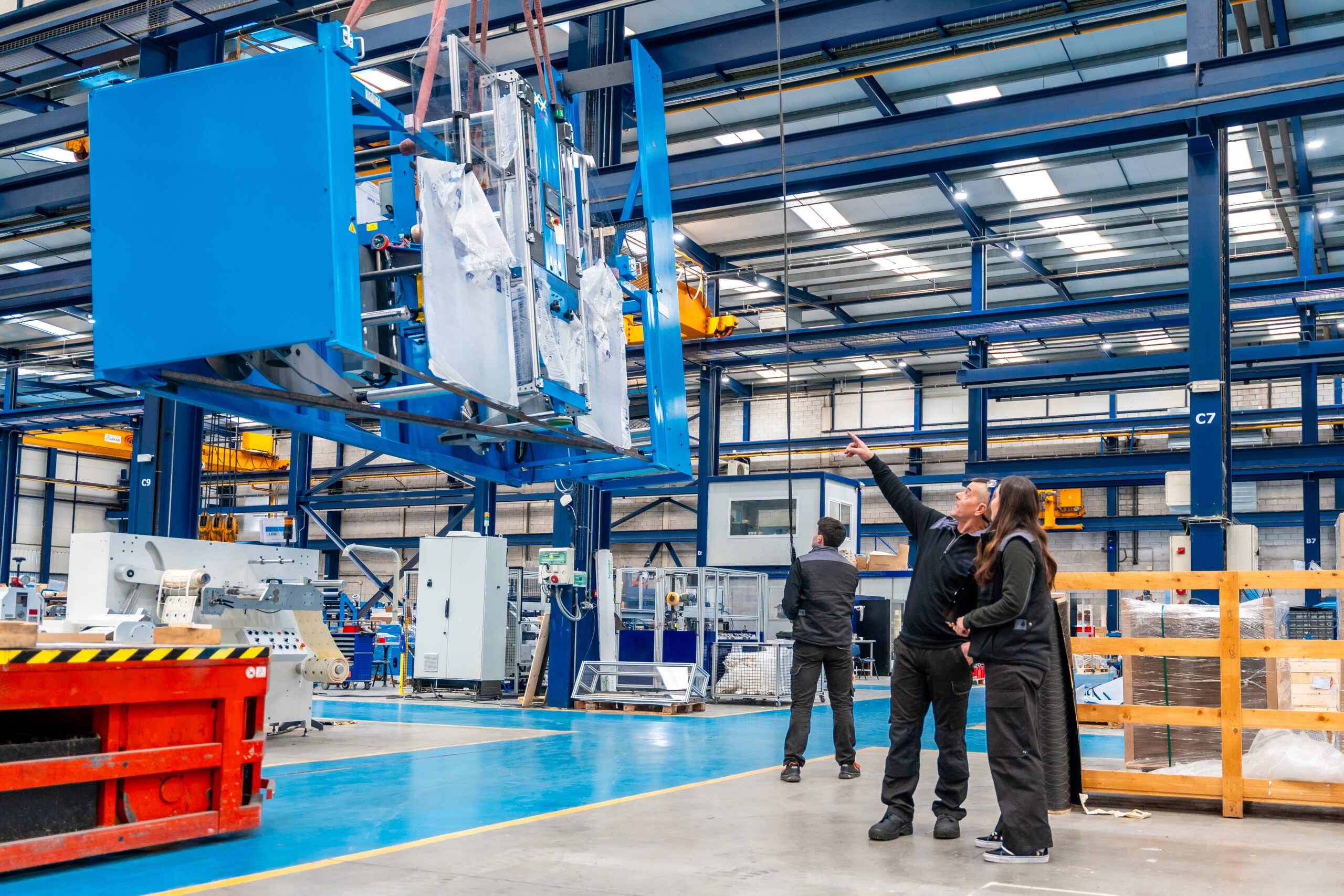 a group of people in a factory