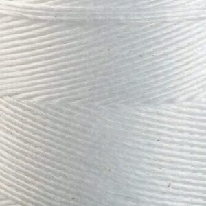 a close up of a spool of thread