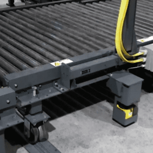 a conveyor belt with a yellow strap