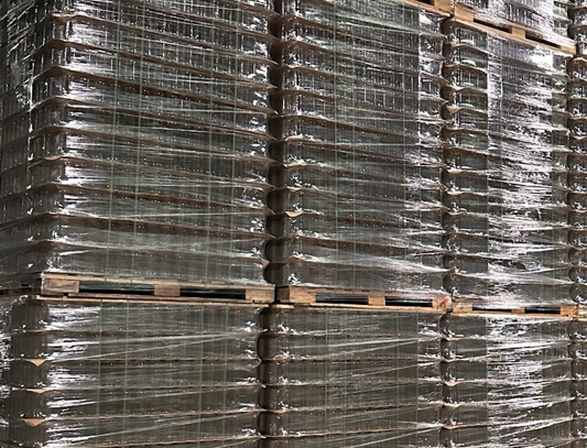 a stack of pallets wrapped in plastic